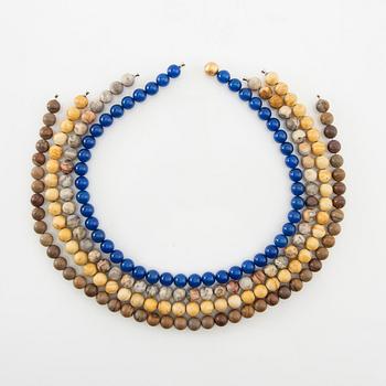 Ole Lynggaard, clasp in 18K gold with 4 pieces of stone necklace.