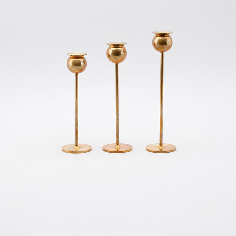 LJUSSTAKAR, 3 st, mässing, "Tulpan", Pierre Forsell, Skultuna.