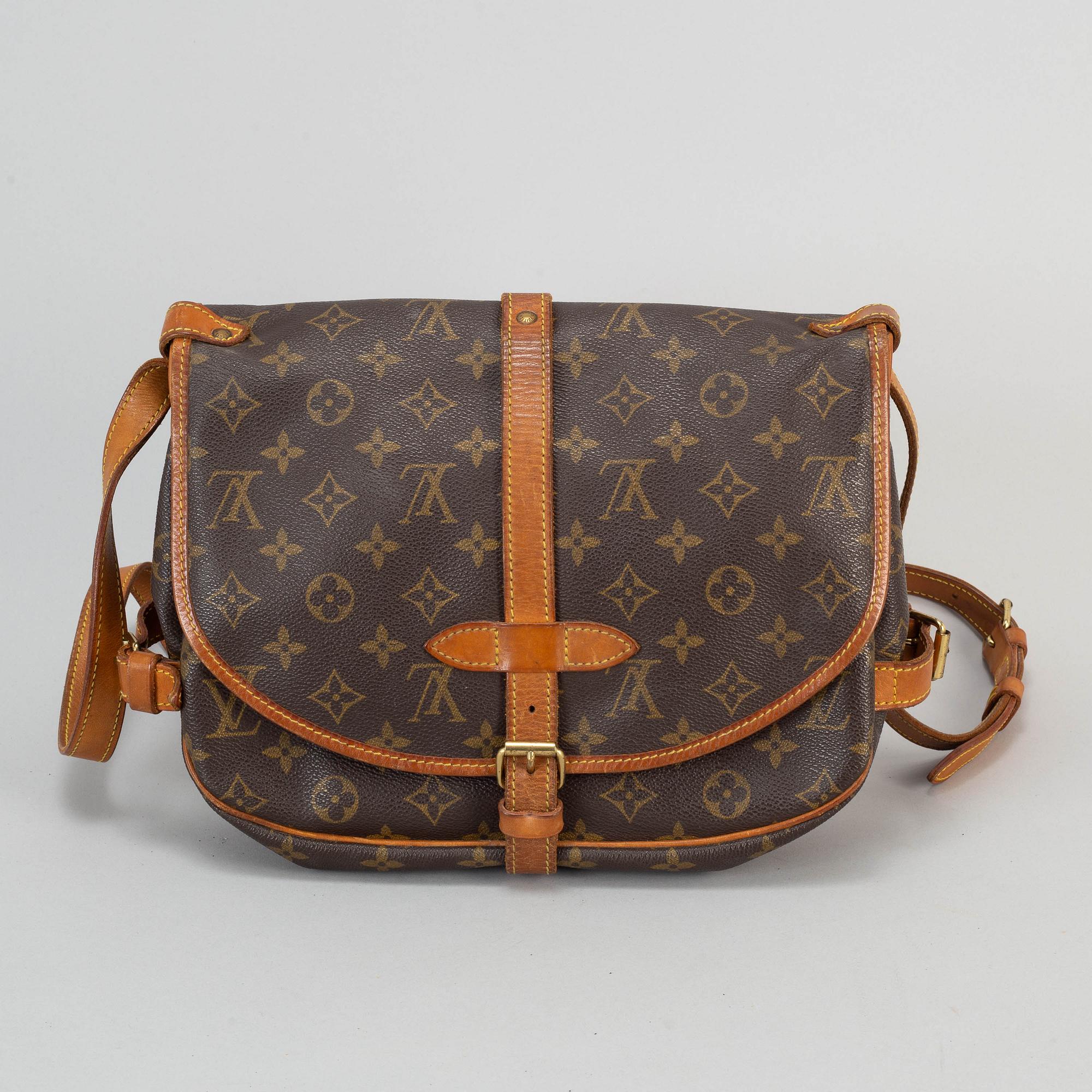 LOUIS VUITTON, 'Monogram Saumur 30'.