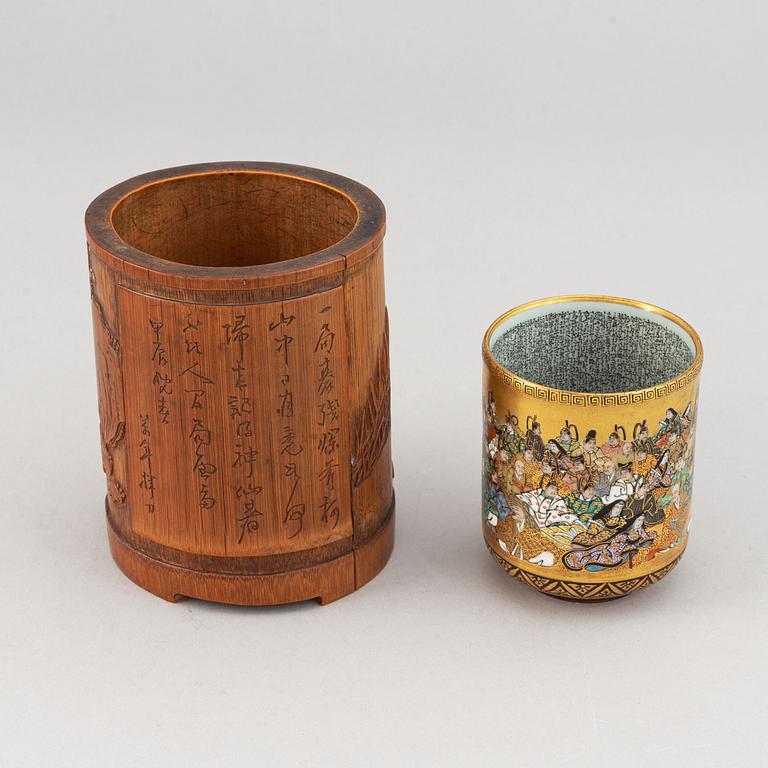 A Japanese satsuma cup and a Chinese bamboo brush holder, 20th century.