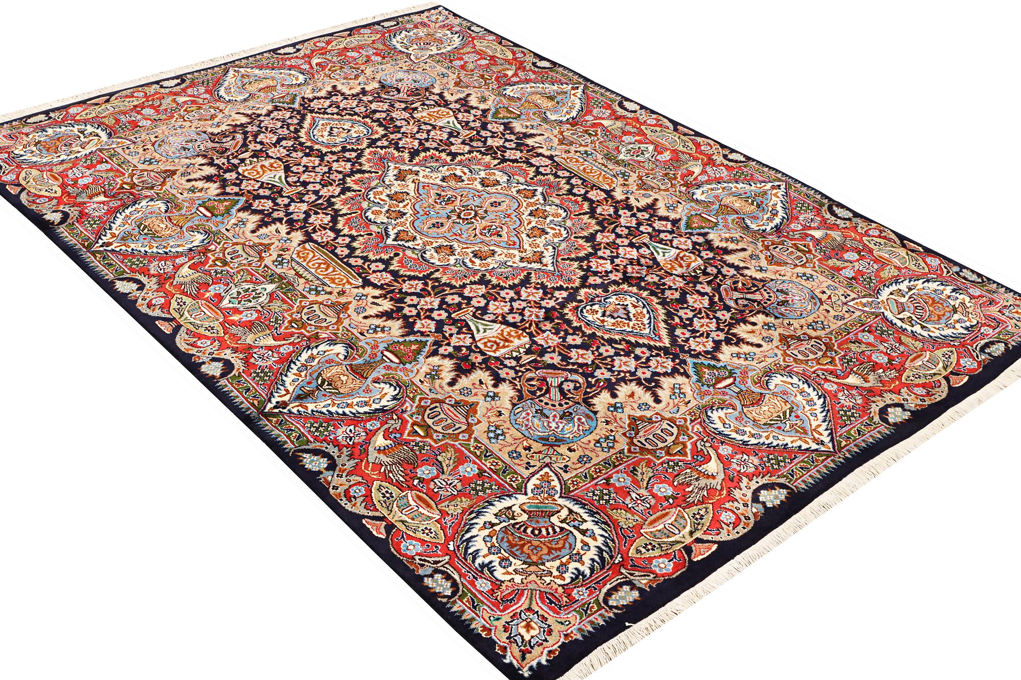A Kashmar carpet, a. 300 x 200 cm.