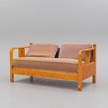 a sofa by NK Stockholm in the 1930's.