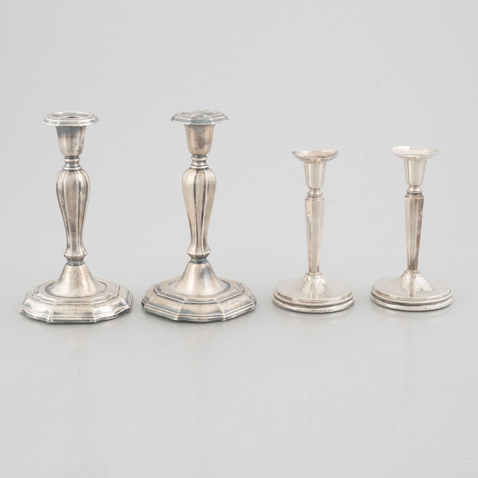 Two pairs of Swedish silver candlesticks, including Eric Löfman, MGAB, Uppsala 1979-1982.