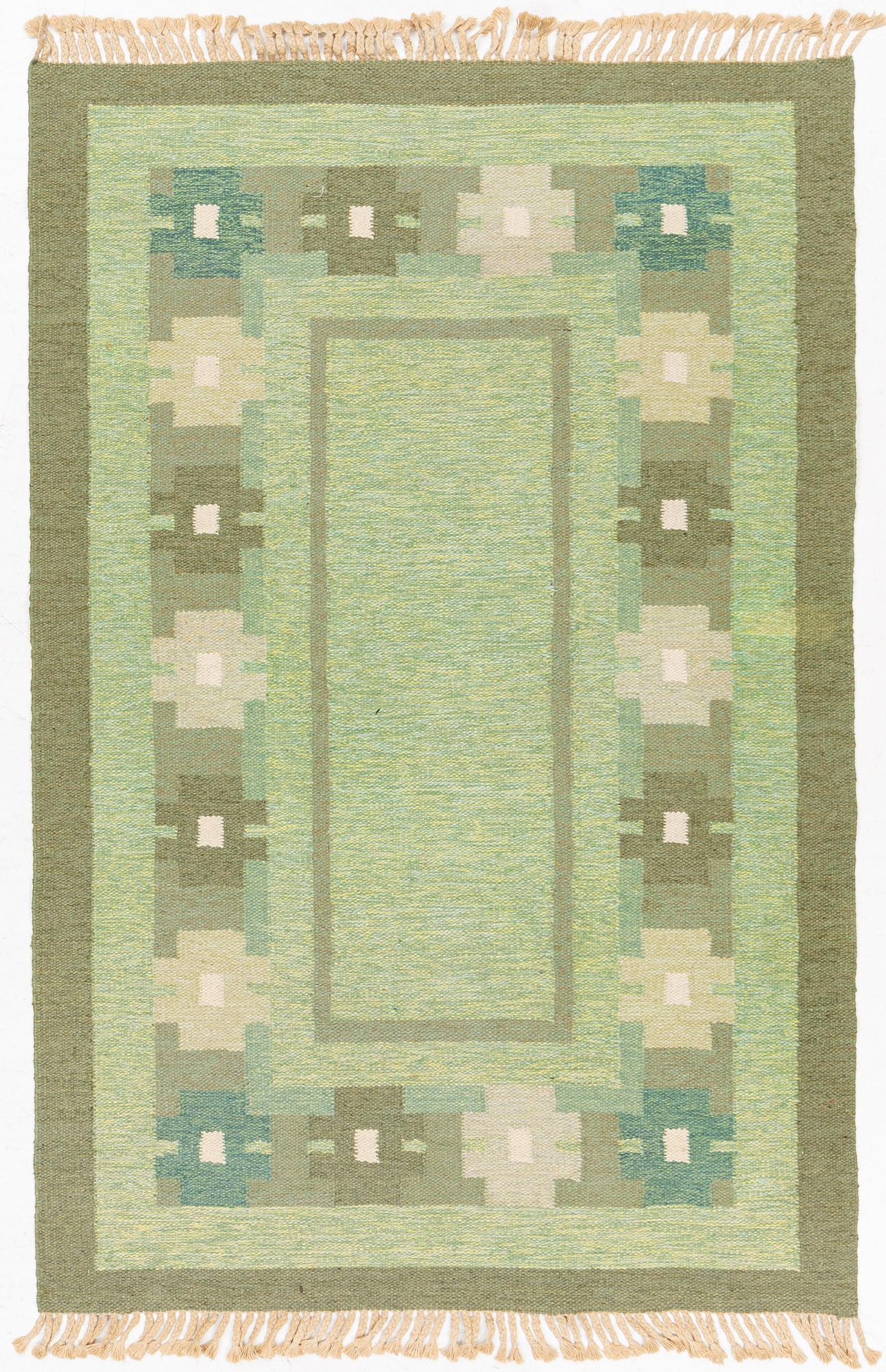 A 1960s flatweave carpet, c 203 x 134.5 cm.