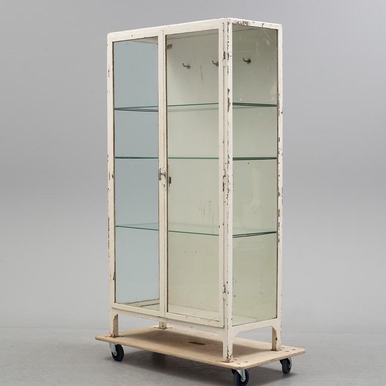 A mid 20th century metal display cabinet.