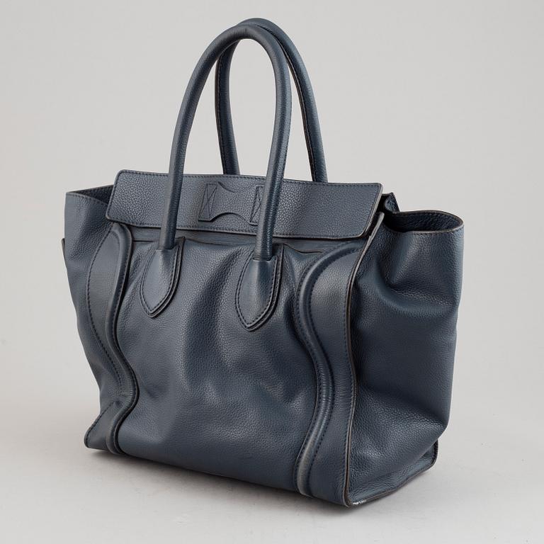 Céline, a teal leather 'Luggage' handbag.