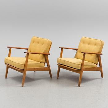 A pair of oak and teak 'Esbjerg' easy chairs from IKEA, 1950's/60's.