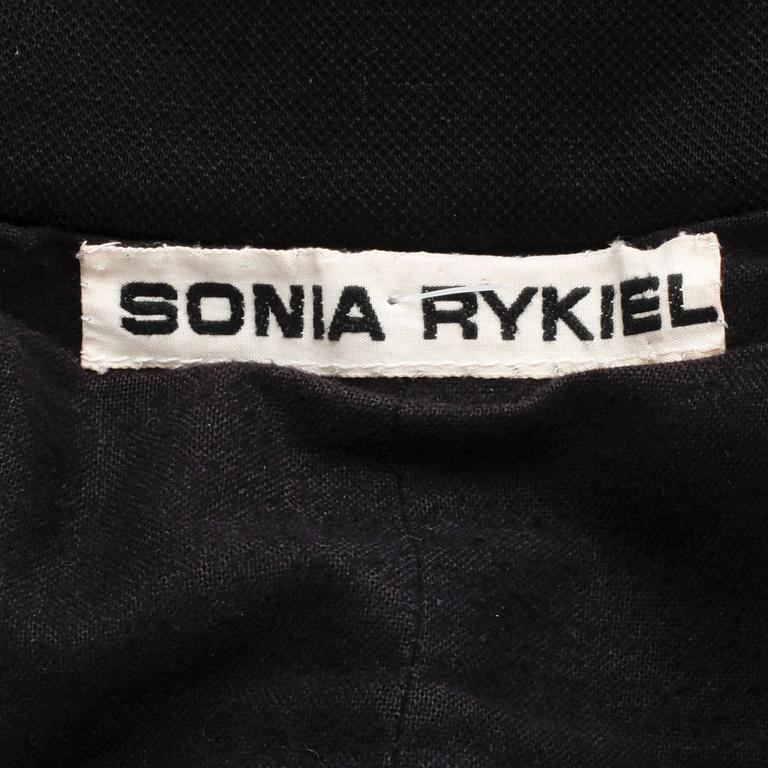 SONIA RYKIEL, a faux fur black coat.