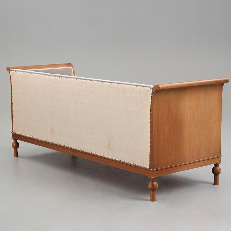 Swedish Grace, a mahogany sofa, reportedly a win in the Stockholm Cabinetmakers association lottery, 1920's.