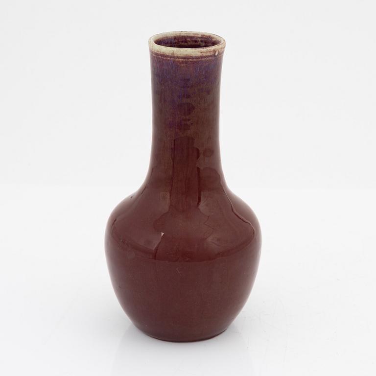 A sang de boef glazed vase, Qing dynasty, circa 1900.