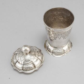 An 18th century silver beaker and cover, fantacy marks like Swedish pewter marks.