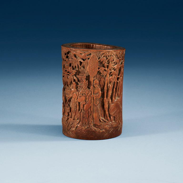 A carved bambu brush pot, late Qing dynasty.