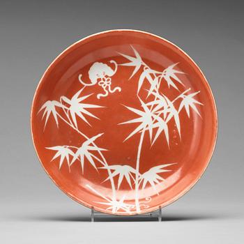 A coral red ground bamboo dish, presumably Republic, early 20th Century.