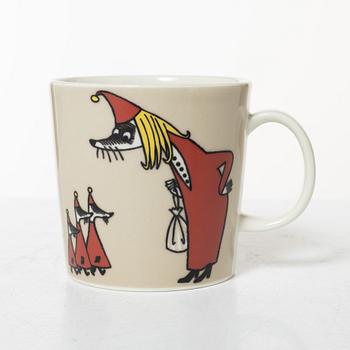 A set of 31 Moomin mugs, Arabia, Finland.