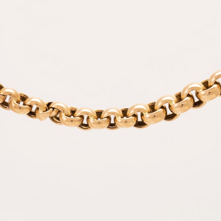 An 18K pocket watch chain.