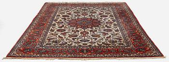 A semi-antique Isfahan carpet, central Persia, c. 314 x 197 cm.