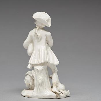 A Swedish Marieberg soft paste figure of a bag-piper, 18th Century.