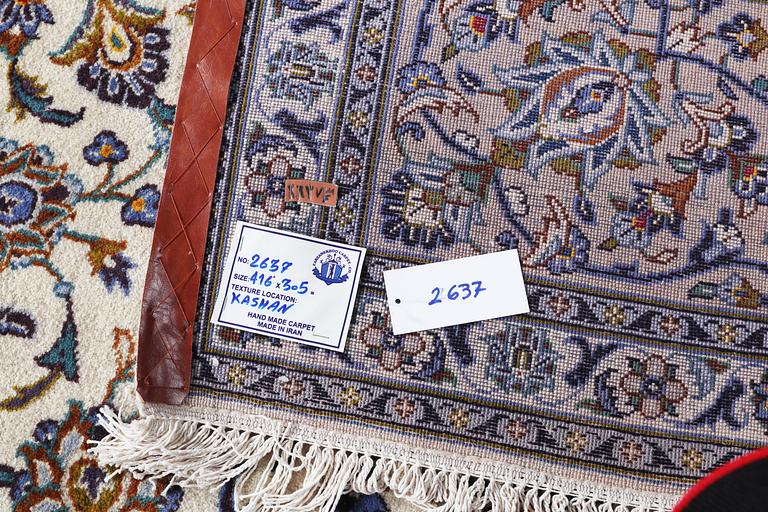 A carpet, Kashan 416 x 303 cm.