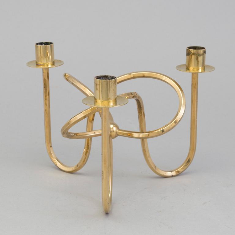A brass candleholder "The knot of Friendship"design Josef Frank for Svenskt Tenn, Stockholm.