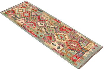 A runner carpet, Kilim, ca 292 x 82 cm.