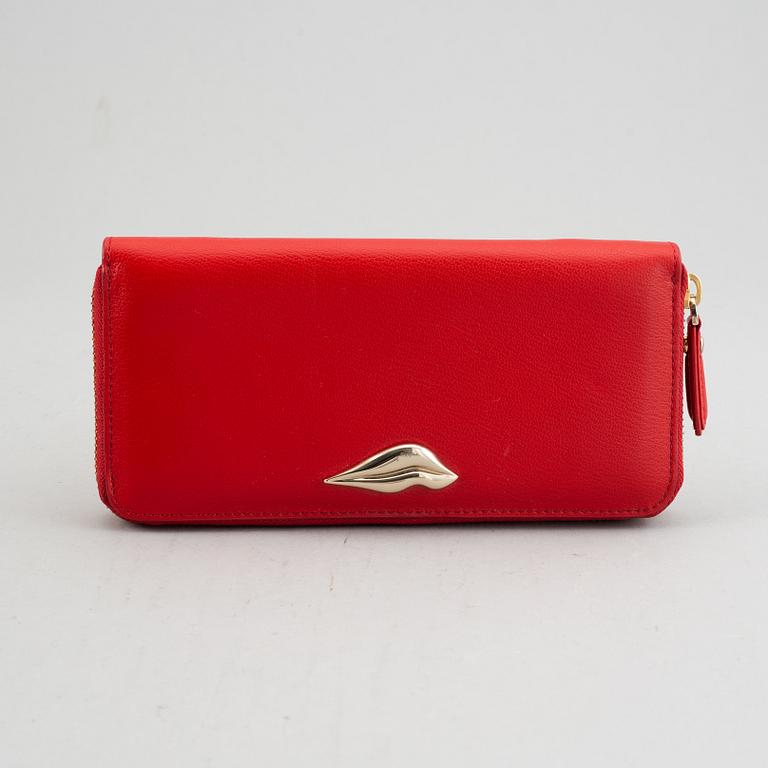 Diane von Fürstenberg a red leather handbag and wallet.