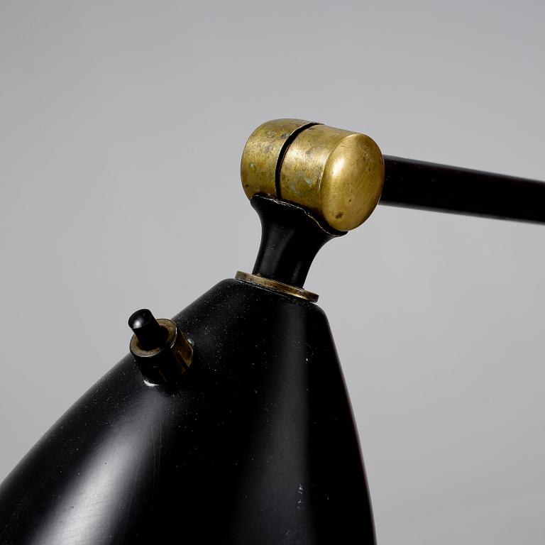 A Greta Magnusson Grossman 'G-33' (Grasshopper) black lacquered floor lamp, Bergboms, Malmö, 1950's.