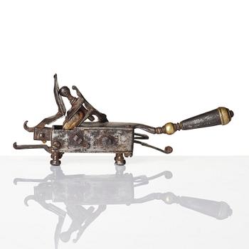 A mechanical flintlock igniter, later part 18th century/early19th century.