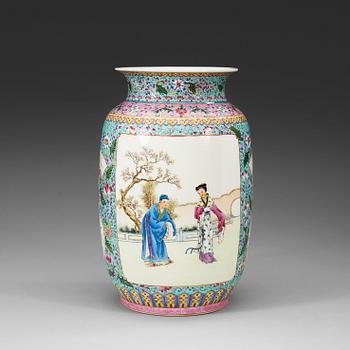 307. A famille rose vase, 20th Century, with Qianlong four character mark.