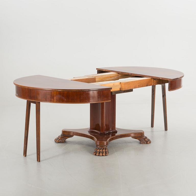 AN EMPIRE STYLE TABLE FROM AROUND 1900.