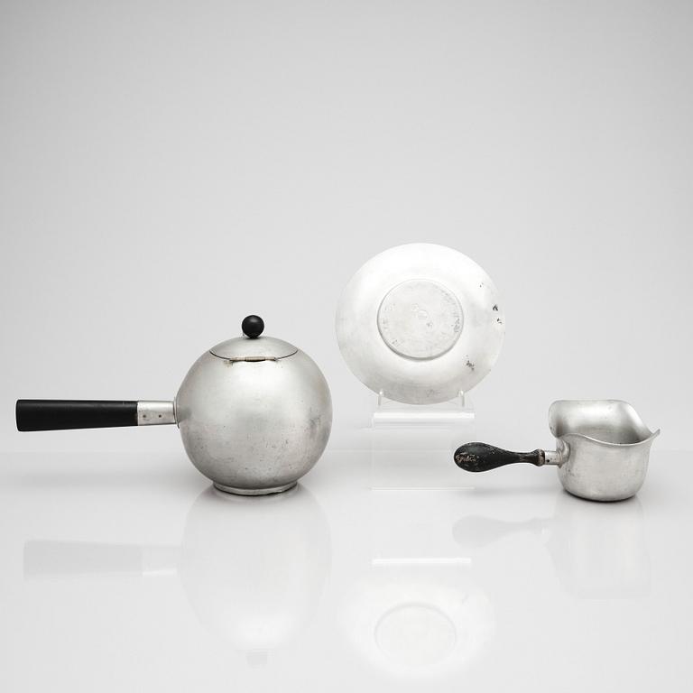 Nils Fougstedt, a pewter teapot and sauceboat with a plate, Svenskt Tenn, 1932, 1949. Alva & Gunnar Myrdal Collection.