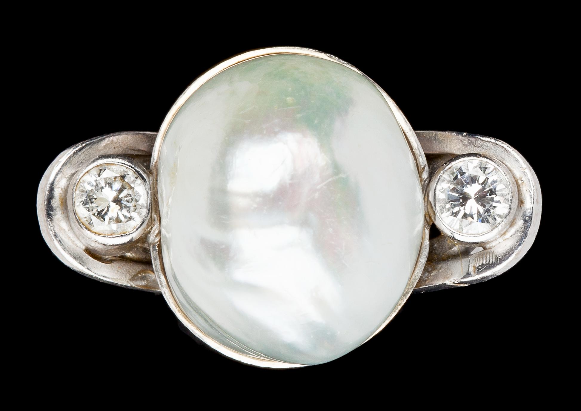 A baroque, possibly natural, pearl and diamond ring, tot. app. 0.30 cts, 1980's.