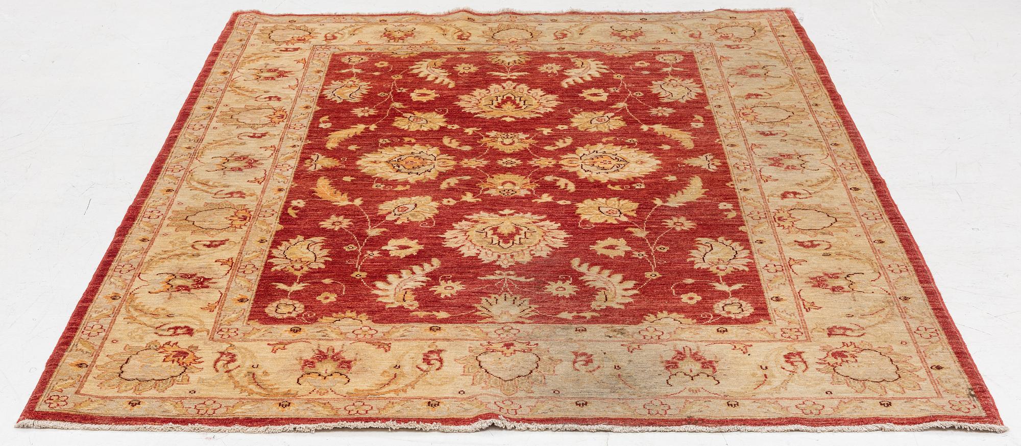 An Ushak carpet, c. 238 x 170 cm.