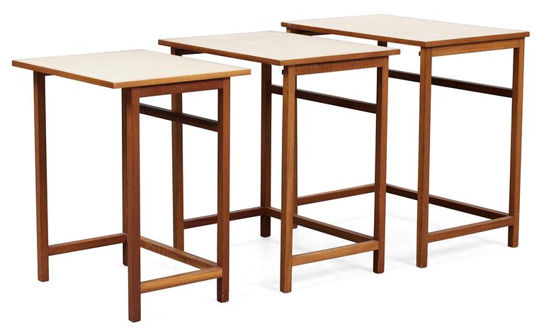 A set of three Josef Frank occasional mahogany tables, Svenskt Tenn, model 618.
