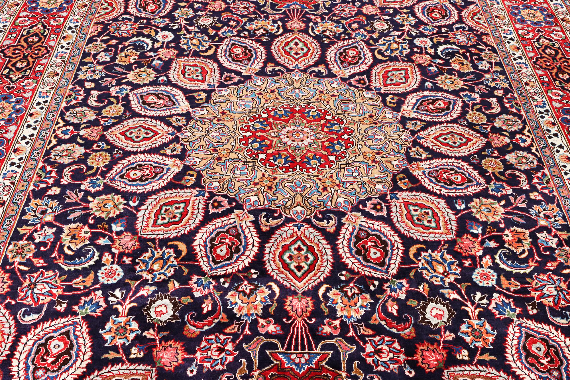 A Meshed carpet, c. 352 x 253 cm.