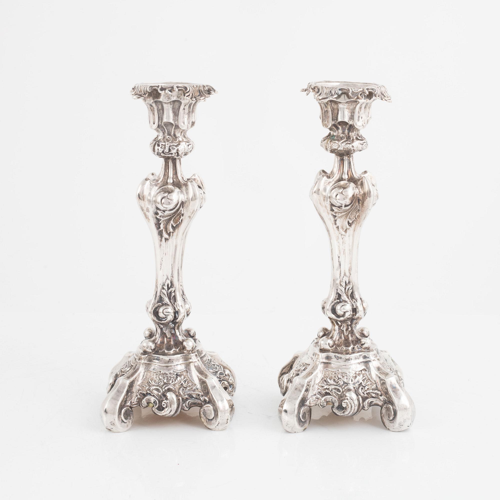 A Pair of Swedish Rococo-Revival Silver Candlesticks, Gustaf Möllenborg, Stockholm 1843-46.
