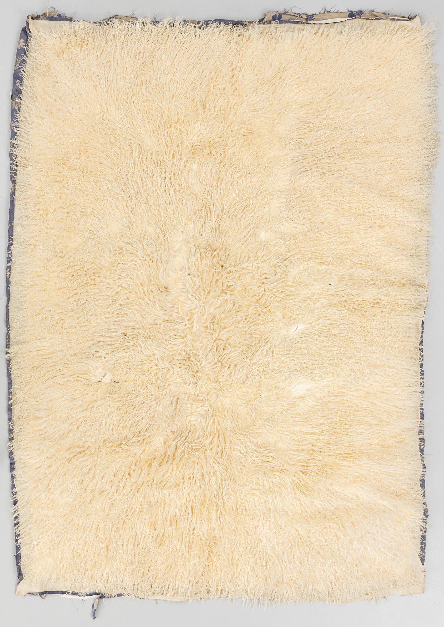 Täcke, siden fodrat med päls. Sen Qingdynasti.