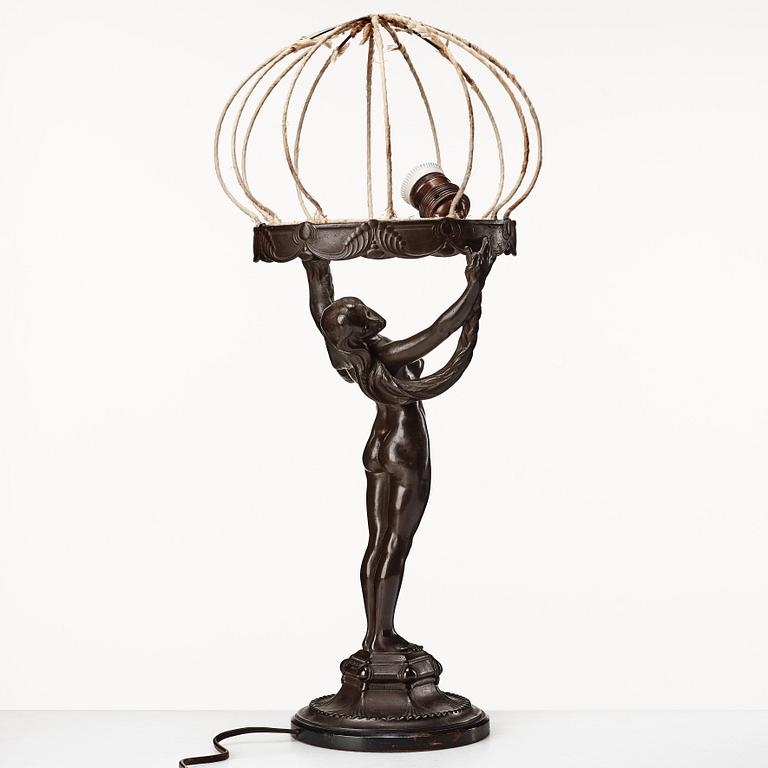 Alfred Ohlson, an Art Nouveau patinated bronze table lamp, Herman Bergman, Stockholm, 1910-20's.