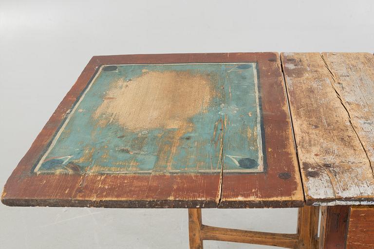 A mid 19th century gateleg table.