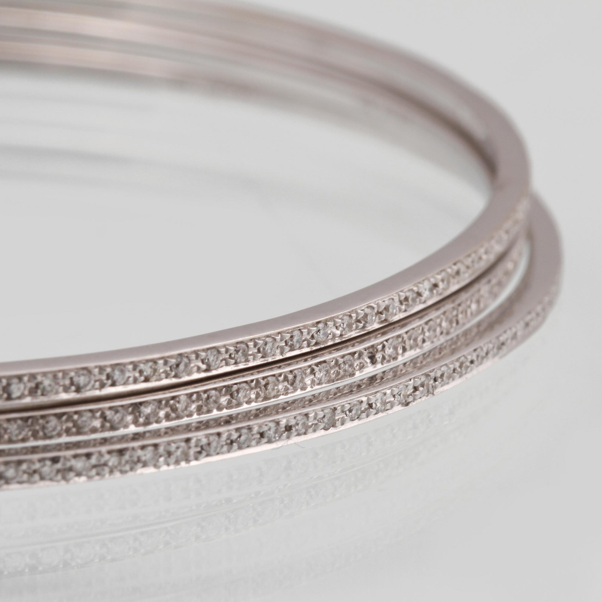 ARMRINGAR, 3 st, 18K vitguld med briljantslipade diamanter ca 1.50 ct. Vikt 19,9 gram.