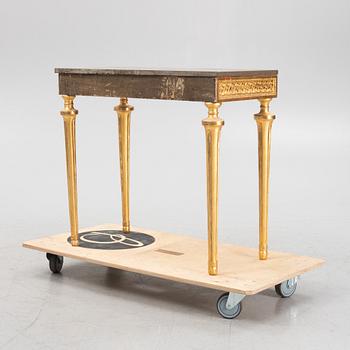 A console table with stone top.