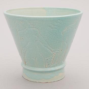 A glazed ceramic pot, signed and dated -34.