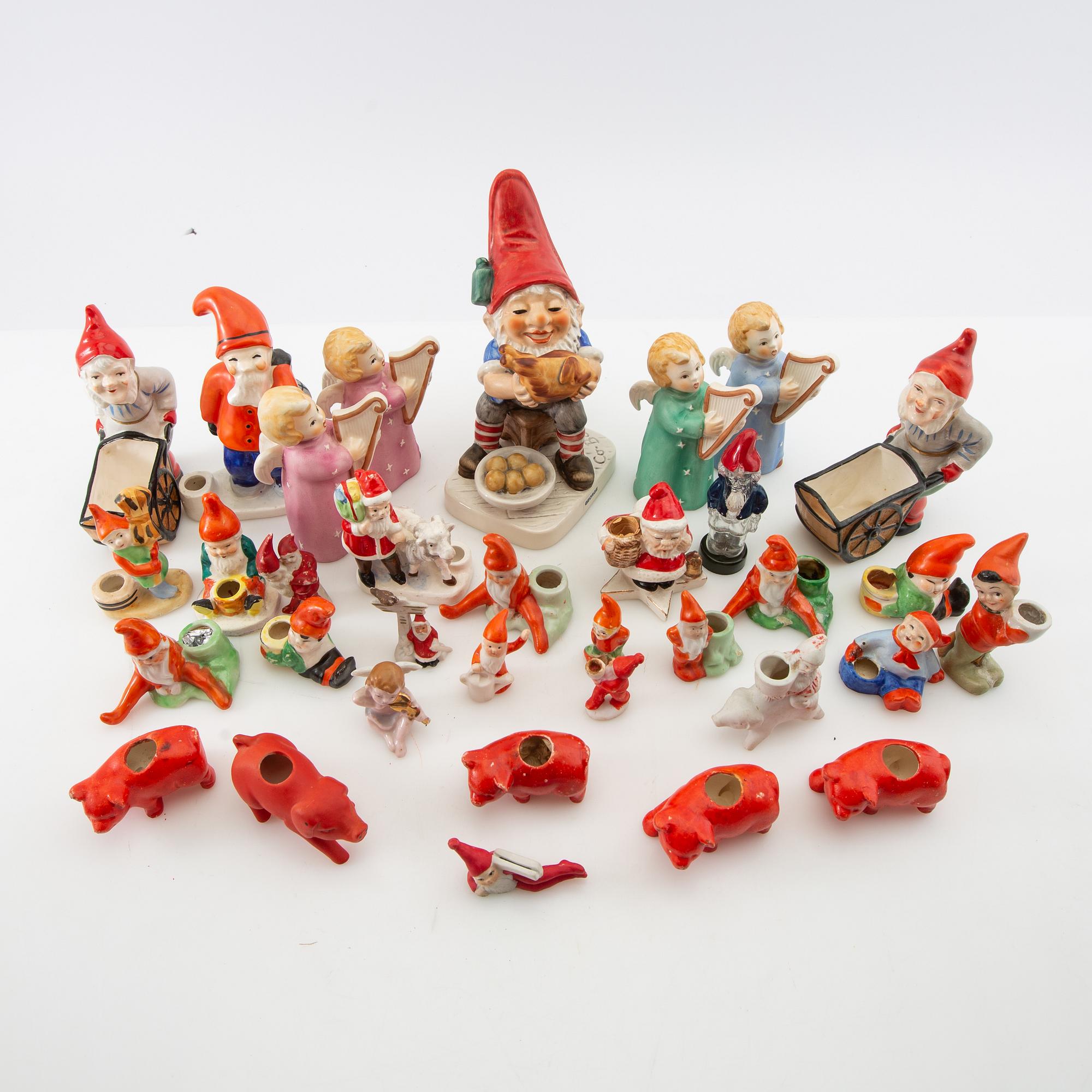 A collection of gnomes, angels, and pigs, approximately 41 pcs, 20th century.