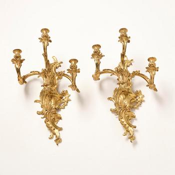 Appliquer, ett par, för tre ljus, omkring år 1900, Louis XV-stil.
