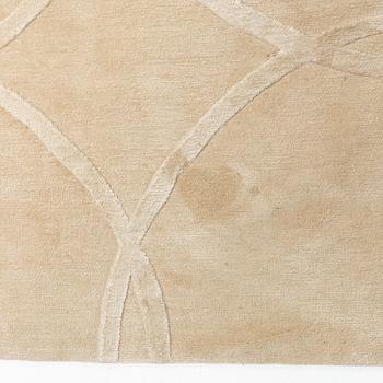 A carpet 360 x 360 cm.