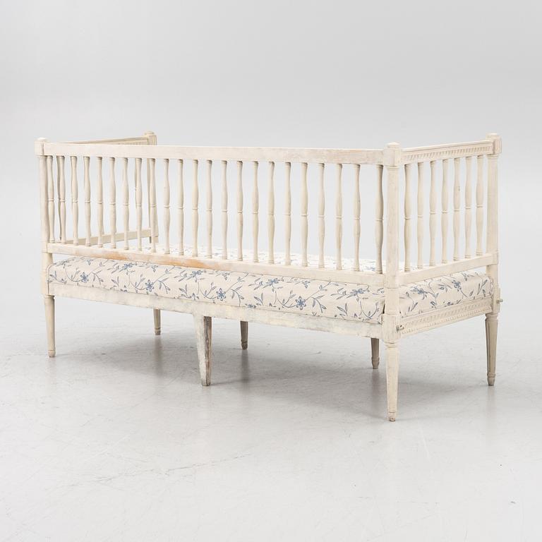 A Gustavian style painted sofa, 19th Century.