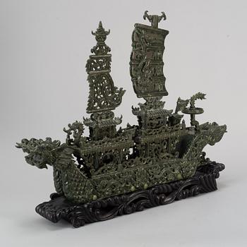 A large Chinese green stone carved sculpture, 20th century.