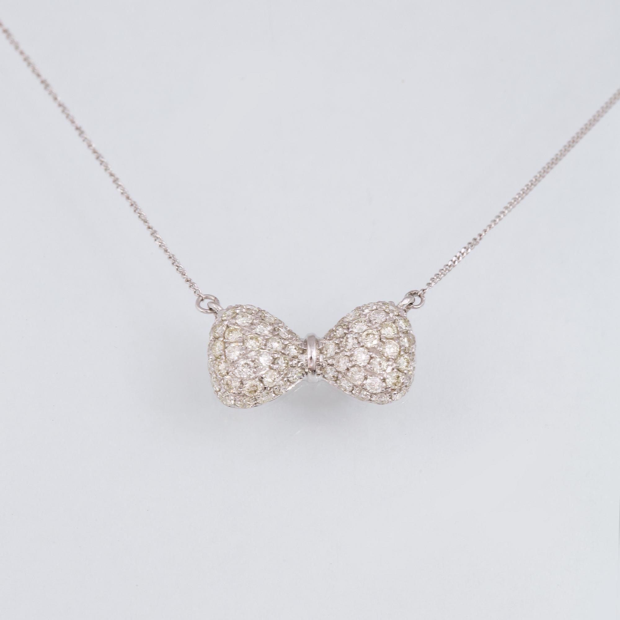 COLLIER, 18K vitguld med briljantslipade diamanter ca 0.60 ct. Vikt 1,8 gram.