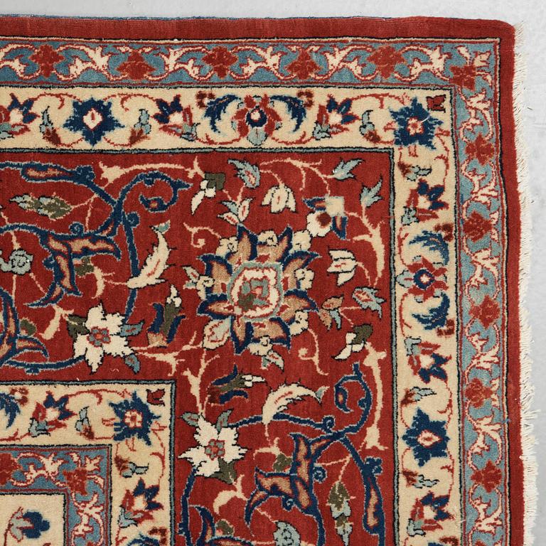A old Esfahan carpet, around 299 x 210 cm.