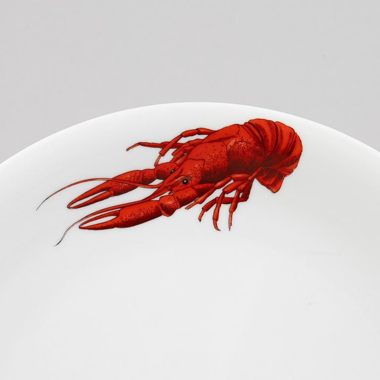 Six porcelain crayfish plates and a serving platter, Rörstrand, Sweden, late 20th century.
