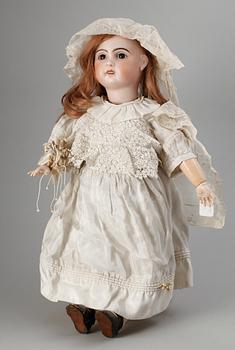 900. A French bisquit doll,marked Jumeau 1907.